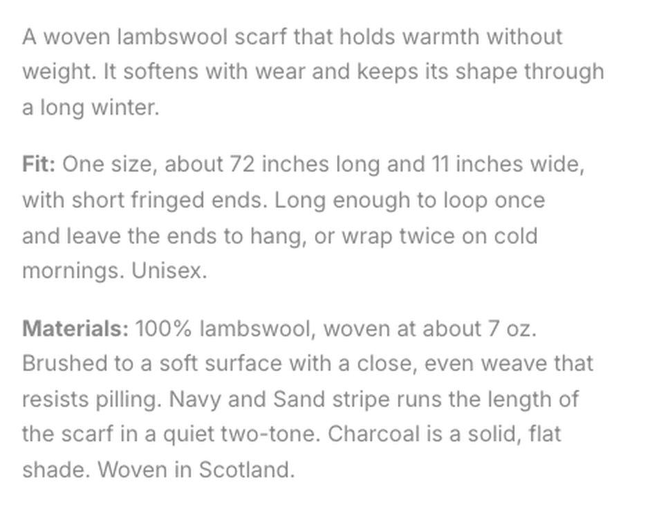 Product description on our demo Store, drawn in a mid grey that sits close to the white page behind it.